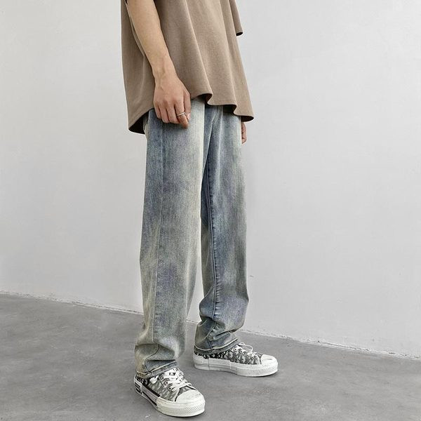 Sinist värvi ja retro stiilis meeste teksad