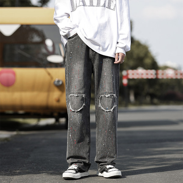 Moodsad tasku ja rebestatud motiividega meeste teksad