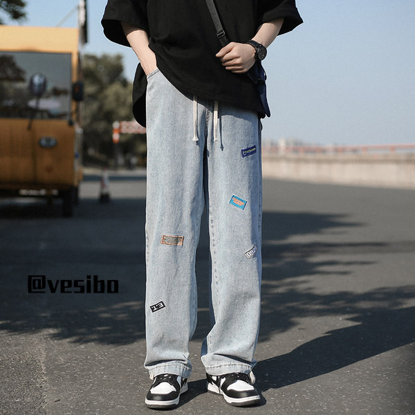 Meeste sirge säärega teksad logo ja paeltega