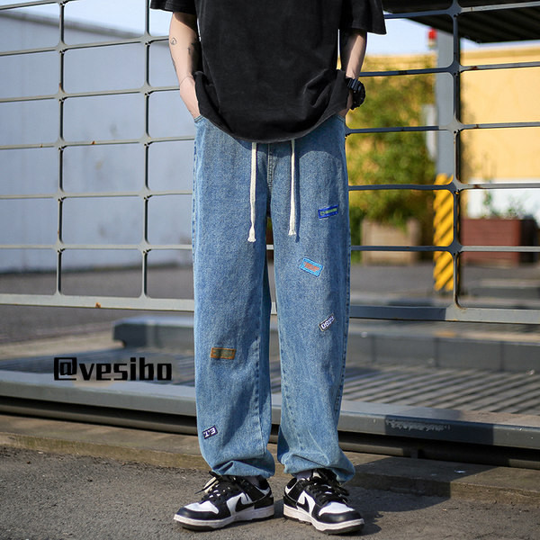 Meeste sirge säärega teksad logo ja paeltega