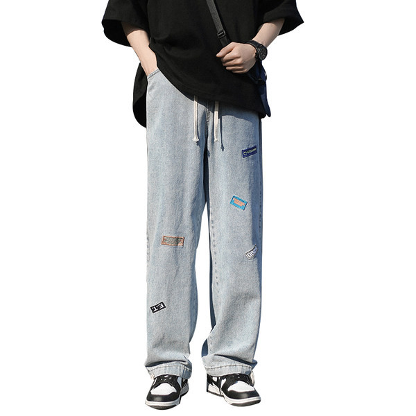 Meeste sirge säärega teksad logo ja paeltega