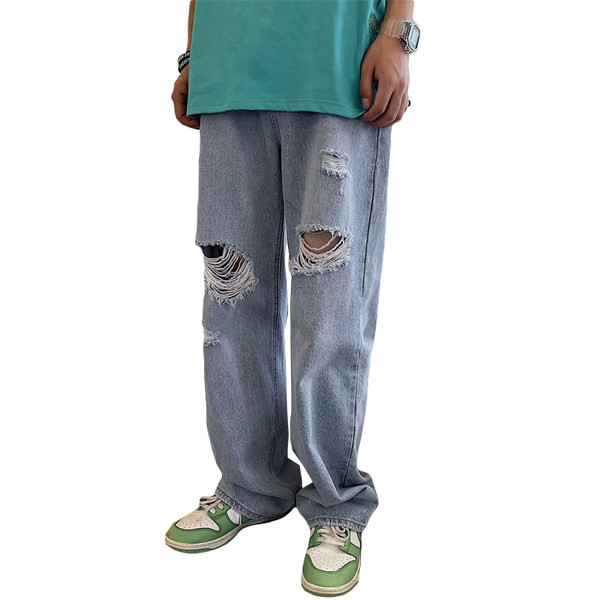 Széles szárú férfi farmer, szakadt motívumokkal