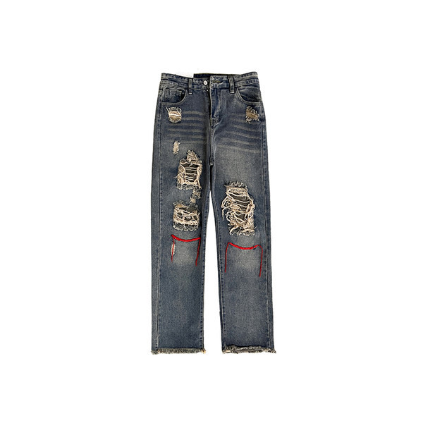 Férfi farmer egyenes mintával és szakadt motívumokkal