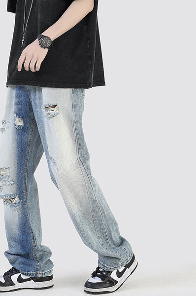 Vyriški stilingi džinsai su plėšytais motyvais