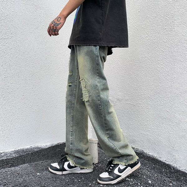 Τζιν σε ίσιο πόδι με τσέπη και σκισμένα μοτίβα