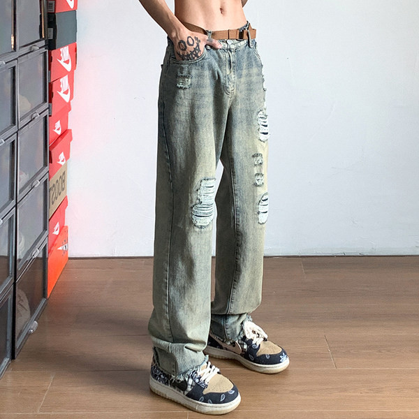 Ретро дънки с джоб и скъсани мотиви