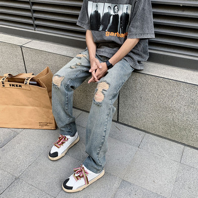 Ανδρικό τζιν με σκισμένα μοτίβα και τσέπη