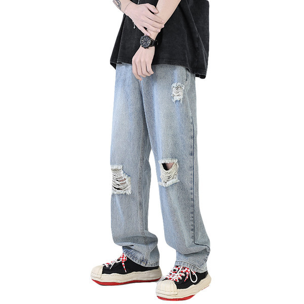 Ανδρικό τζιν με φαρδιά εφαρμογή με τσέπη και σκισμένα μοτίβα