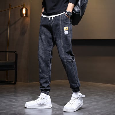 Paelte ja logoga vabaaja teksad meestele