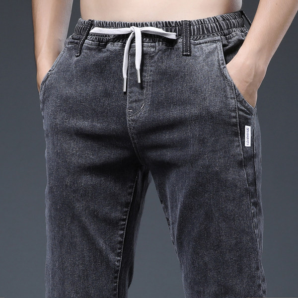 Vyriški siauri sportiniai-laisvalaikio džinsai su raišteliais