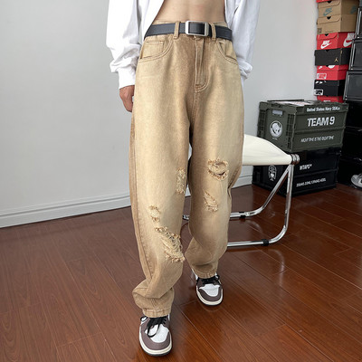 Férfi magas derekú farmer, szakadt motívumokkal