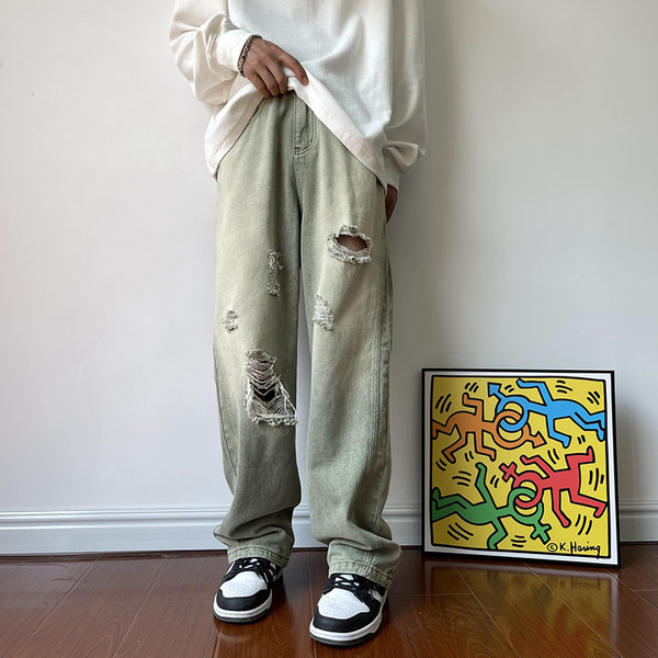 Férfi magas derekú farmer, szakadt motívumokkal