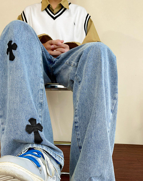 Férfi farmer díszkereszttel