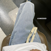 Ανδρικό τζιν με κορδόνια φαρδύ μοντέλο