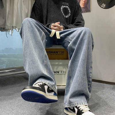 Ανδρικό τζιν με κορδόνια φαρδύ μοντέλο