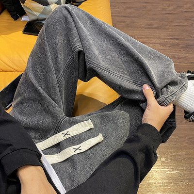 Ανδρικό τζιν με κορδόνια φαρδύ μοντέλο