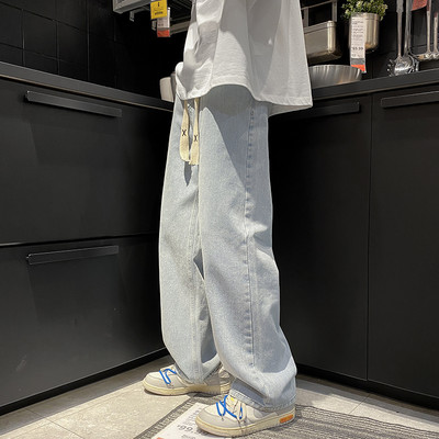 Ανδρικό τζιν με κορδόνια φαρδύ μοντέλο