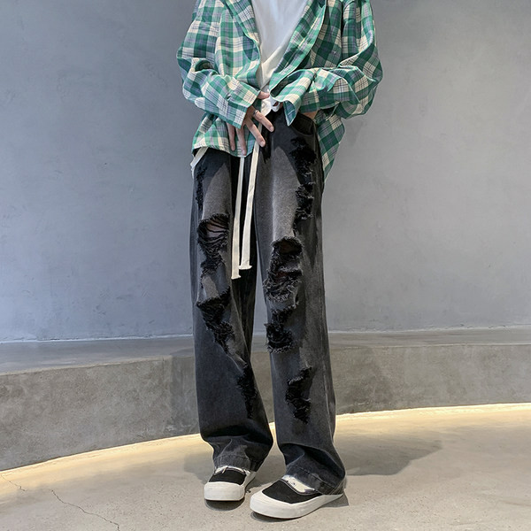 Széles szabású férfi farmer fűzős, szakadt motívumokkal