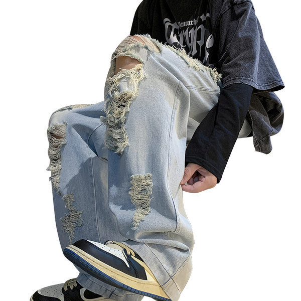 Széles szabású férfi farmer fűzős, szakadt motívumokkal