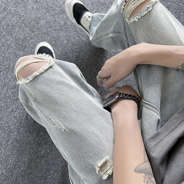 Vyriški džinsai aukštu juosmeniu ir kišenėmis