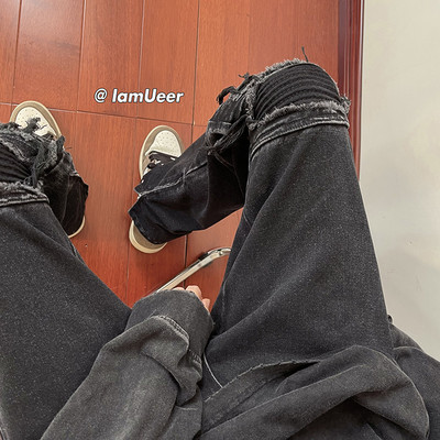 Meeste kahevärvilised rebitud motiividega teksad