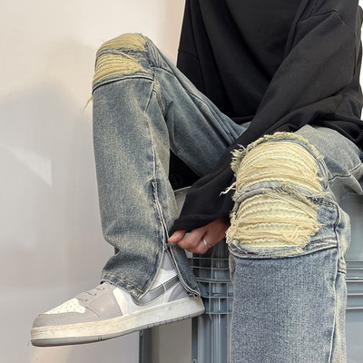 Meeste kahevärvilised rebitud motiividega teksad