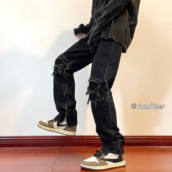 Meeste kahevärvilised rebitud motiividega teksad