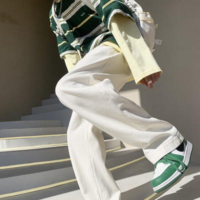 Vyriški plataus modelio džinsai su kišene ir diržu