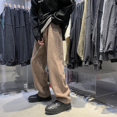 Vyriški plataus modelio džinsai su kišene ir diržu