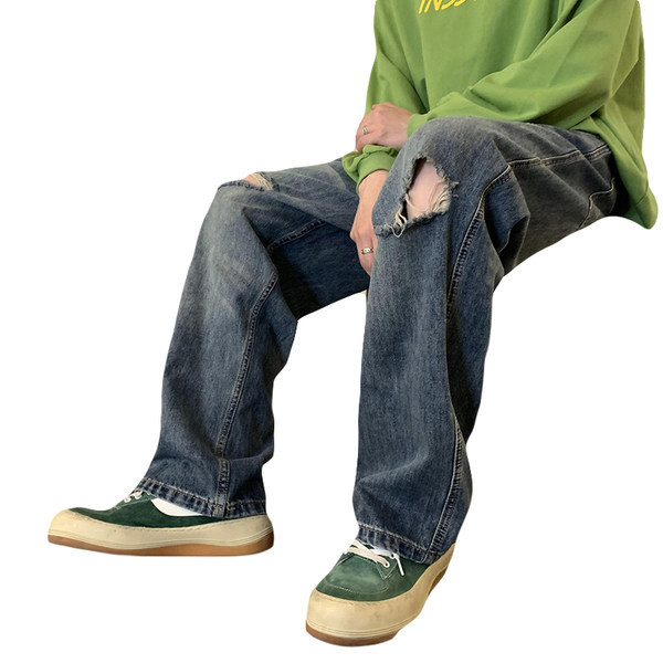 Férfi farmer zsebbel, szakadt motívumokkal