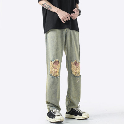 Alkalmi férfi farmer több színben, szakadt motívummal