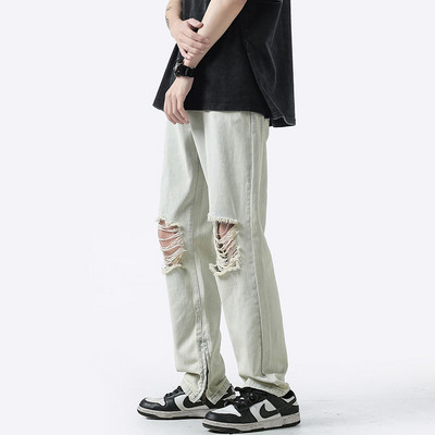 Alkalmi férfi farmer több színben, szakadt motívummal