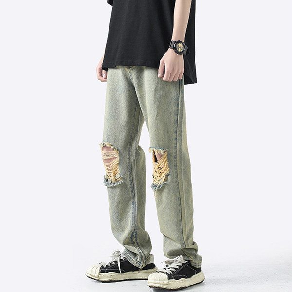 Alkalmi férfi farmer több színben, szakadt motívummal