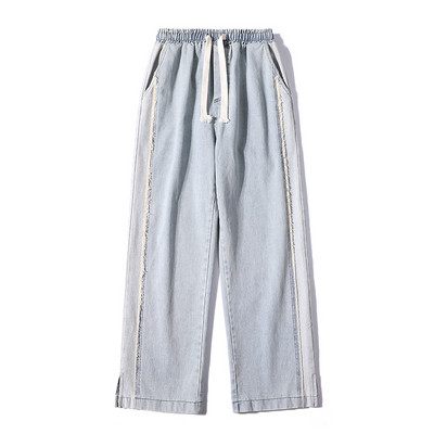 Széles modell férfi farmer fűzővel és hasítékkal a szárán