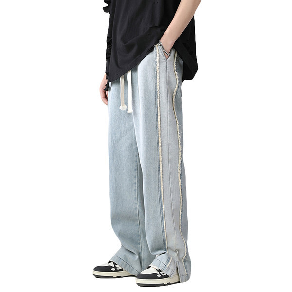 Széles modell férfi farmer fűzővel és hasítékkal a szárán