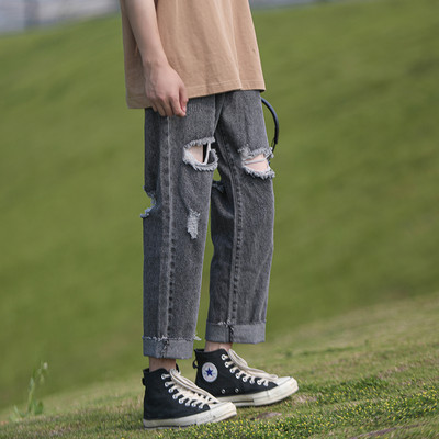 Rebenenud elemendiga meeste teksapükste sirge mudel