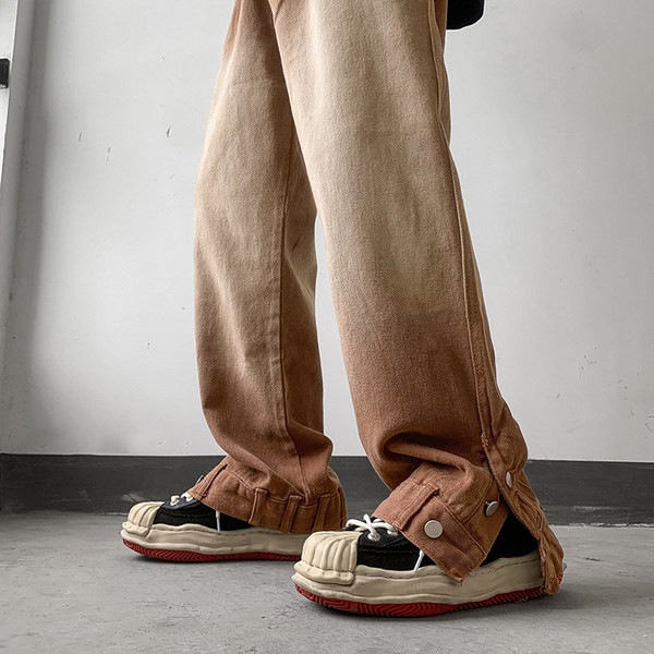 Dviejų spalvų vyriški džinsai su užsegimu kojose