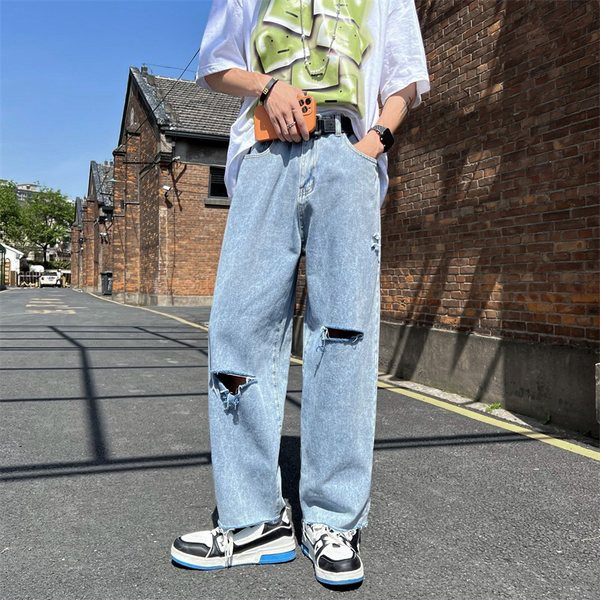 Férfi magas derekú farmer, szakadt motívumokkal