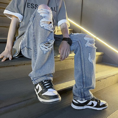 Szakadt motívumokkal ellátott férfi farmer három színben