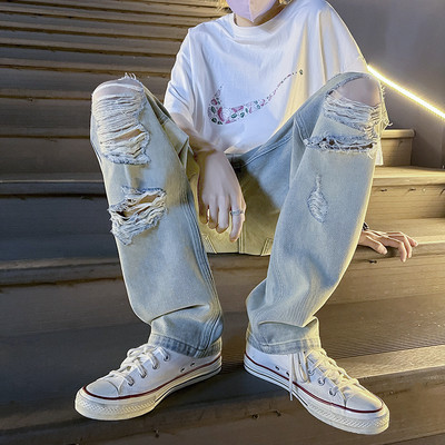 Szakadt motívumokkal ellátott férfi farmer három színben