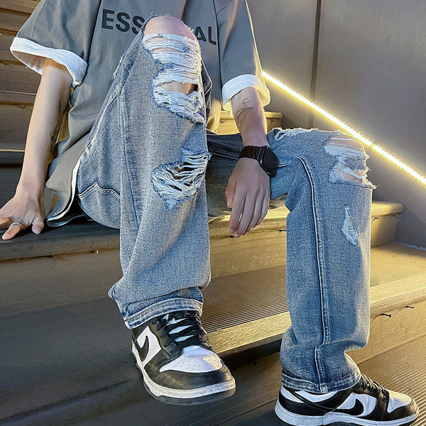 Szakadt motívumokkal ellátott férfi farmer három színben