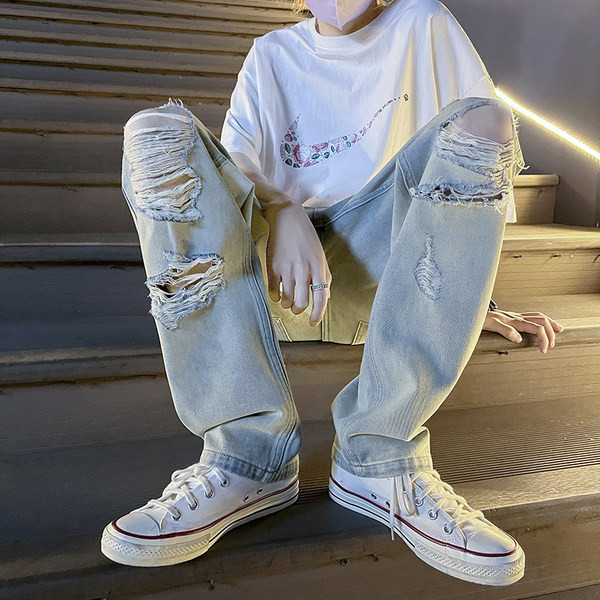 Szakadt motívumokkal ellátott férfi farmer három színben