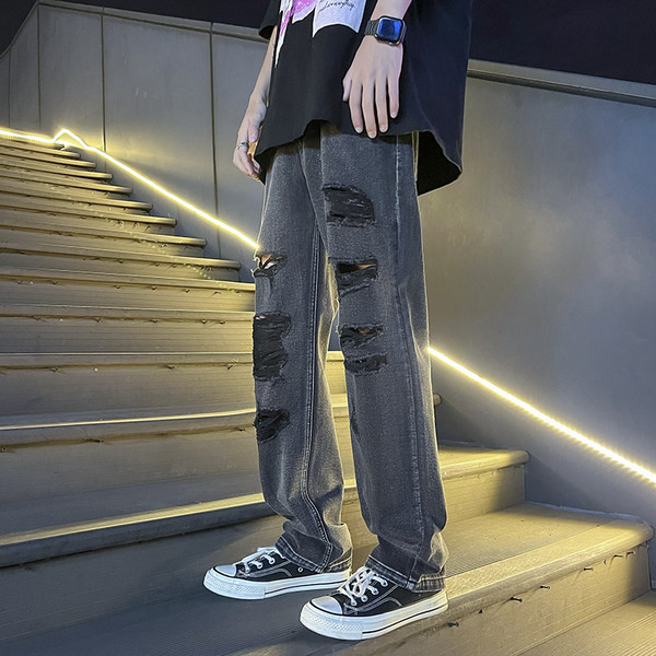 Szakadt motívumokkal ellátott férfi farmer három színben