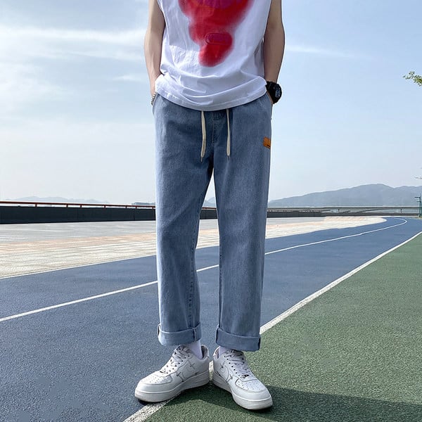 Széles szárú férfi farmernadrág zsebbel