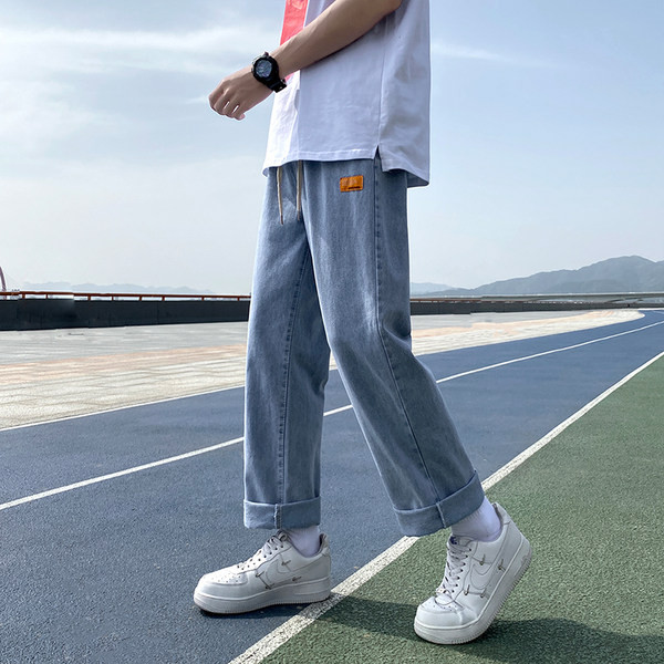 Széles szárú férfi farmernadrág zsebbel