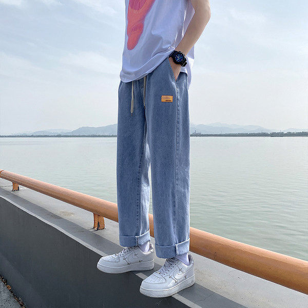 Széles szárú férfi farmernadrág zsebbel