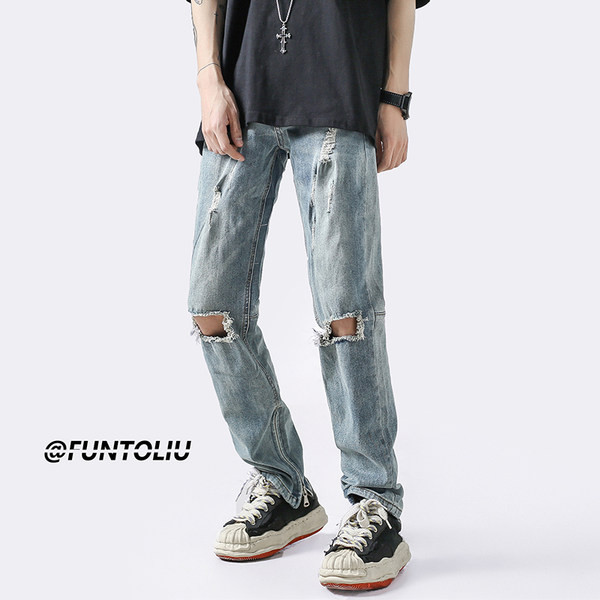 Szakadt motívumú férfi farmer