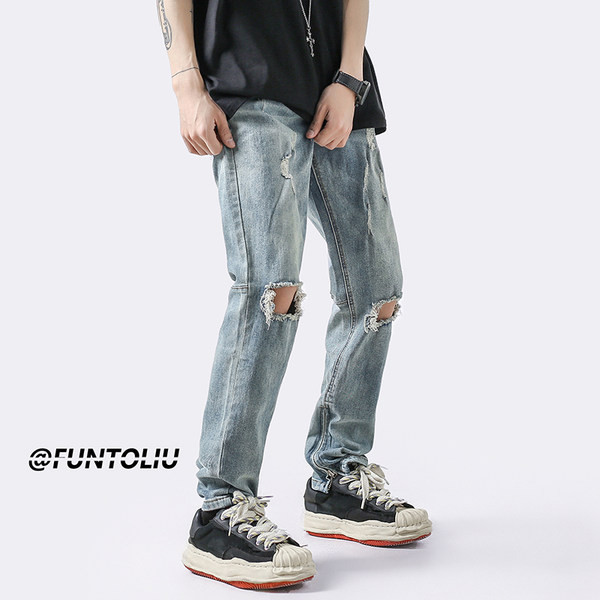 Szakadt motívumú férfi farmer