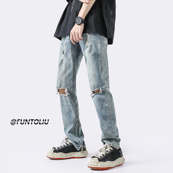 Szakadt motívumú férfi farmer