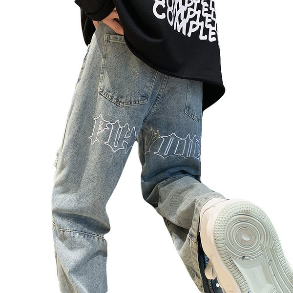 Meeste teksapükste lai mudel tasku ja kirjaga